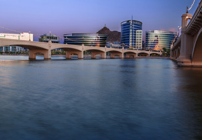 Tempe Arizona photographed from the Salt River during blue hour.